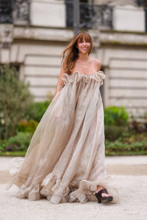 Carla Ginola wears light brown sheer mesh Zimmermann maxi dress, outside Zimmermann, during the Paris Fashion week Women's Fall/Winter 2025-2026 on...