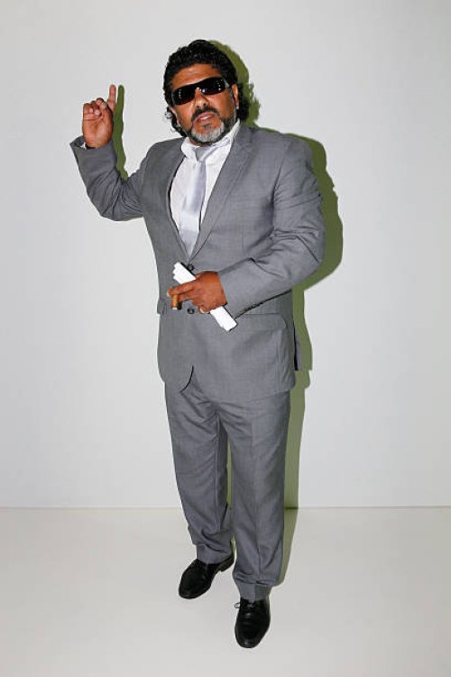 Celebrity impersonator of Diego Maradona attends the Ewa Herzog show during the Mercedes-Benz Fashion Week Berlin Spring/Summer 2016 at Brandenburg...