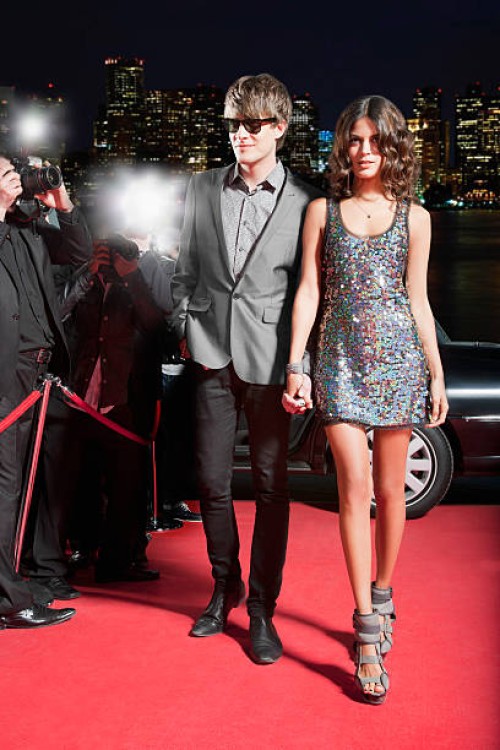 celebrity walking on red carpet - fashion stock pictures, royalty-free photos & images