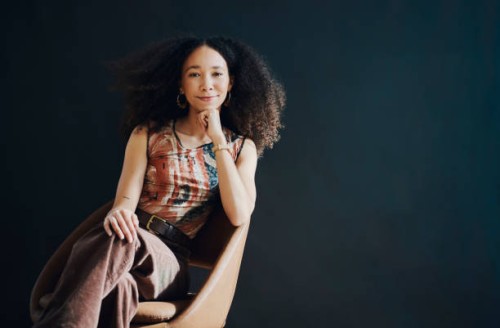 chair, trendy and beautiful black woman isolated on dark background for success, creative vision and mock up space. confident, attitude and smart person portrait for female empowerment on wall mockup - fashion stock pictures,