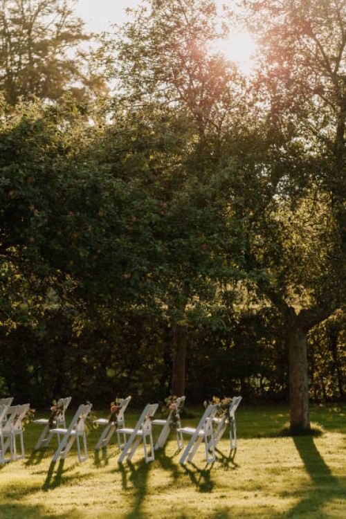 chairs lined up for wedding ceremony - garden decoration stock pictures, royalty-free photos & images