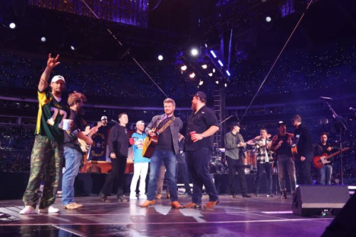 Chase Rice, Scotty McCreery, Bailey Zimmerman, Luke Combs, Wesko, Bob Crawford and Scott Avett of The Avett Brothers and Eric Church perform onstage...