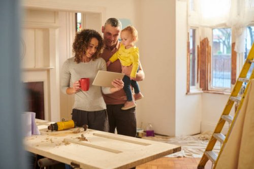 checking their house insurance - home decoration stock pictures, royalty-free photos & images