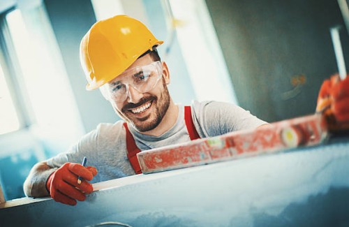 cheerful construction worker. - home decoration stock pictures, royalty-free photos & images