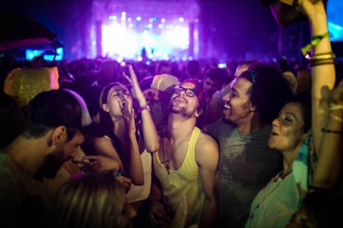 cheerful friends dancing on a music festival by night. - concert stock pictures, royalty-free photos & images