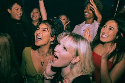 cheerful multiracial men and women shouting and dancing at nightclub - concert stock pictures, royalty-free photos & images