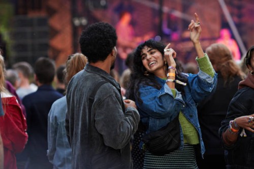 cheerful woman dancing with boyfriend - concert stock pictures, royalty-free photos & images