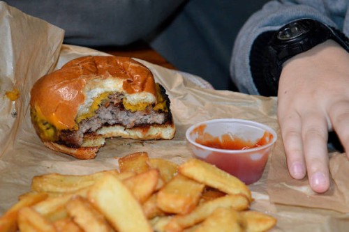 cheeseburger and french fries - junk food stock pictures, royalty-free photos & images