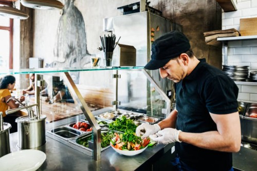 chef preparing salad dish for customer - food stock pictures, royalty-free photos & images