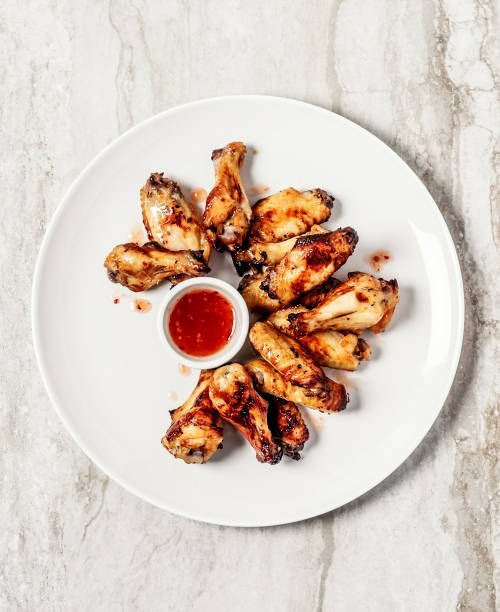 chicken wings - junk food stock pictures, royalty-free photos & images