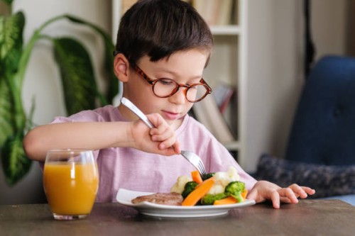 child eating vegetables - food stock pictures, royalty-free photos & images