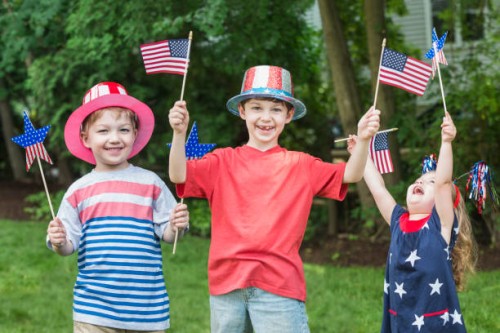 children celebrating independence day together - garden decoration stock pictures, royalty-free photos & images