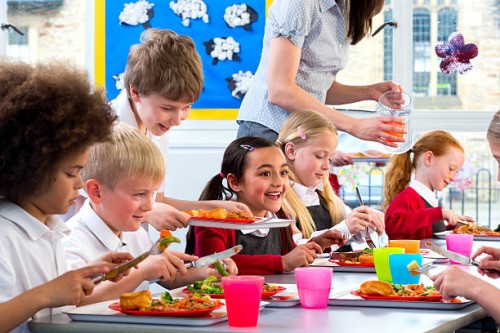 children eating school dinners - food stock pictures, royalty-free photos & images