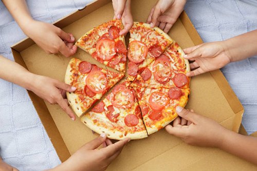 children's hands taking pizza slices out or box - junk food stock pictures, royalty-free photos & images