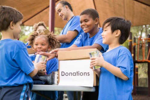 children's sports team charity drive for donations, local disaster relief. - food stock pictures, royalty-free photos & images