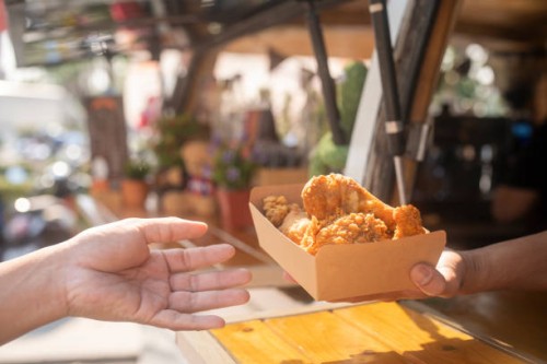 choosing and buying different types of fast food in eat market - junk food stock pictures, royalty-free photos & images
