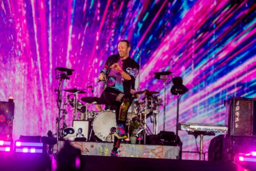 Chris Martin of Coldplay performs live on stage at Parken Stadium on July 5, 2023 in Copenhagen, Denmark.
