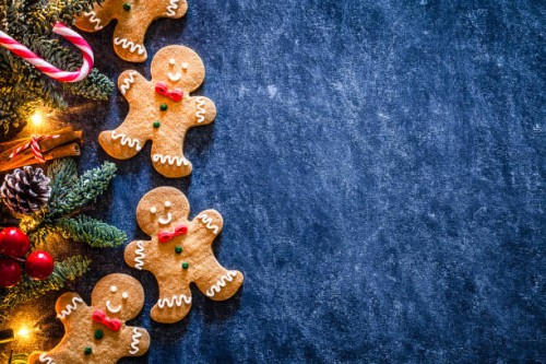 christmas backgrounds: homemade gingerbread cookies border with copy space. - food stock pictures, royalty-free photos & images