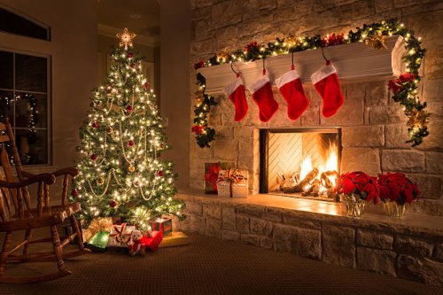 christmas. glowing fireplace, hearth, tree. red stockings. gifts and decorations. - home decoration stock pictures, royalty-free photos & images