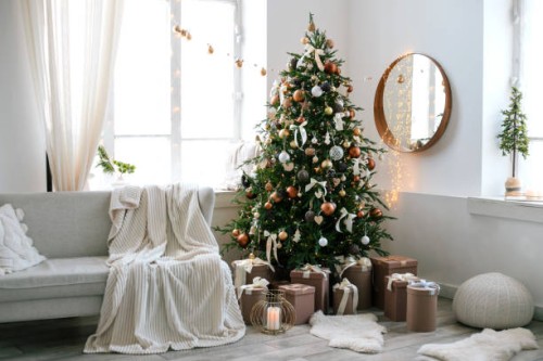 christmas tree decorating in home. - home decoration stockfoto's en -beelden
