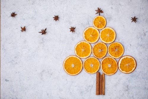christmas tree made of slices of dried oranges, cinnamon sticks and star anise. stock photo - home decoration stock pictures, royalty-free photos & images