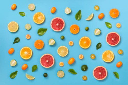 citrus fruits pattern background. - food stock pictures, royalty-free photos & images
