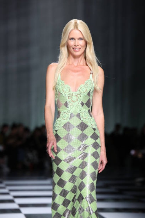 Claudia Schiffer walks the runway at the Versace fashion show during the Milan Fashion Week Womenswear Spring/Summer 2024 on September 22, 2023 in...
