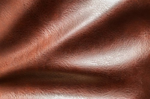 close-up of a brown leather and textured background. - home decoration stockfoto's en -beelden