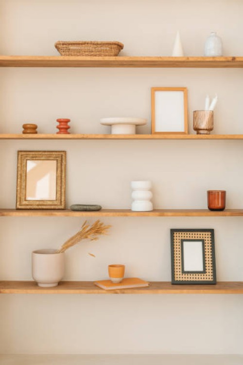 close-up of assorted ornaments, vases and mirrors on shelves - home decoration stock pictures, royalty-free photos & images