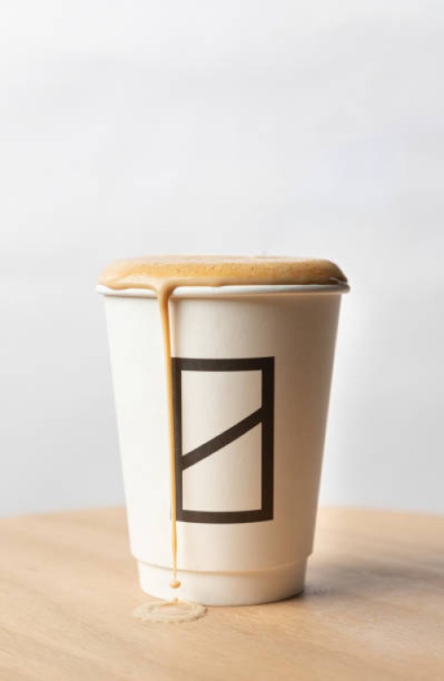 close-up of coffee cup on table,amman,jordan - junk food stock pictures, royalty-free photos & images