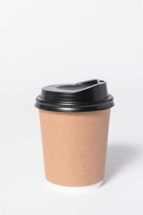 close-up of disposable cup against white background - junk food stock pictures, royalty-free photos & images
