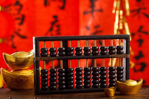 close-up of gold ingots and abacus - home decoration stock pictures, royalty-free photos & images