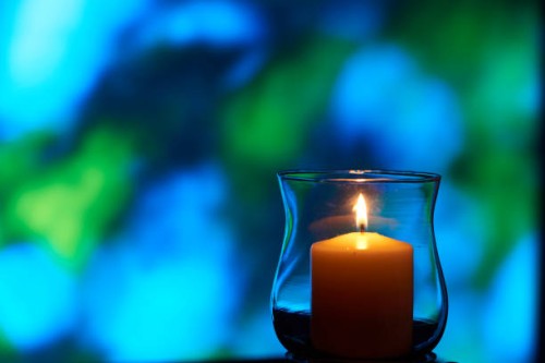close-up of lit candle - garden decoration stock pictures, royalty-free photos & images
