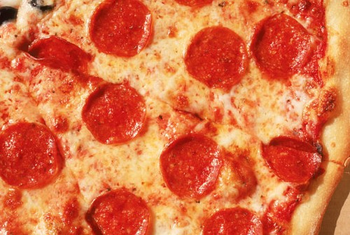 close-up of pepperoni pizza - junk food stock pictures, royalty-free photos & images