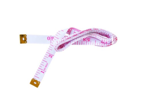 close-up of tape measure over white background,romania - fashion stock pictures, royalty-free photos & images