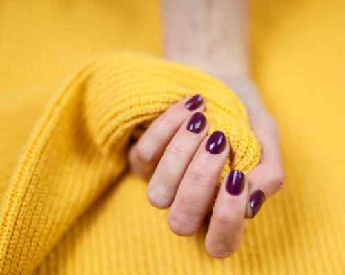 close-up of woman fingers with nail art. maroon nail polish - nails art stock pictures, royalty-free photos & images