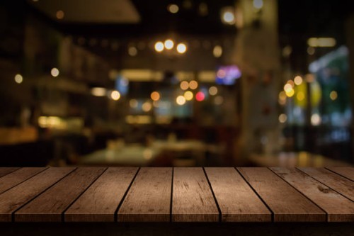 close-up of wooden table in restaurant - home decoration stock pictures, royalty-free photos & images
