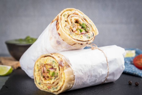 close-up of wrap sandwich on table,united arab emirates - junk food stock pictures, royalty-free photos & images