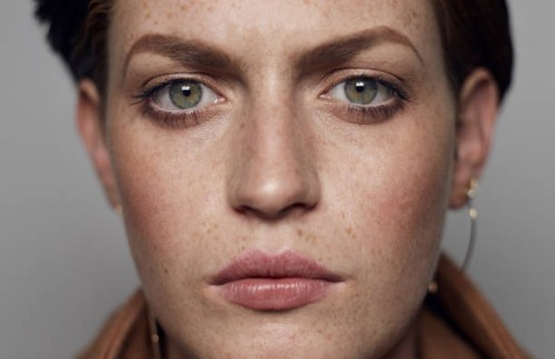 close-up portrait of beautiful young woman looking in camera, shot on studio - fashion stock pictures, royalty-free photos & images