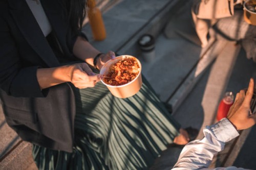 close-up takeaway bowls with asian business team - junk food stock pictures, royalty-free photos & images