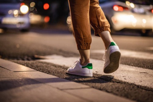 close up human legs walking on the crosswalk - fashion stock pictures, royalty-free photos & images