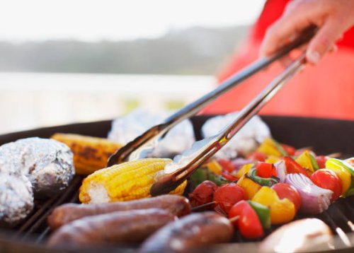 close up of man grilling food on barbecue - food stock pictures, royalty-free photos & images