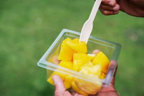 close up of man having a fruit snack - junk food stock pictures, royalty-free photos & images