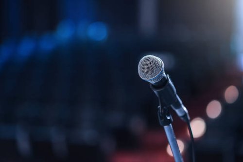 close up of microphone in concert hall or conference room - concert stock pictures, royalty-free photos & images