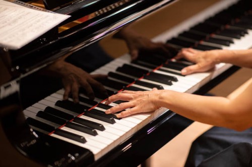 close up of pianist playing the piano at concert - concert stock pictures, royalty-free photos & images