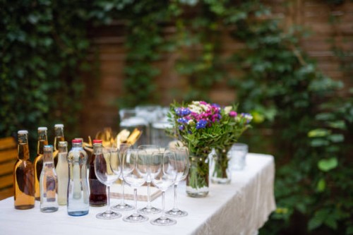 close up of table ready for family dinner outdoors in garden. - garden decoration stock pictures, royalty-free photos & images