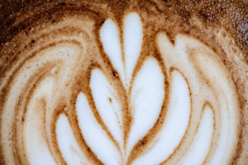 close up of the surface of latte art. - coffee stockfoto's en -beelden