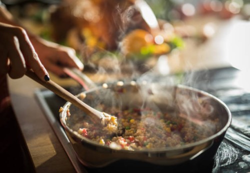 close up of unrecognizable woman preparing lunch in the kitchen. - food stock pictures, royalty-free photos & images