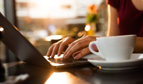 close up of working on laptop. - coffee stock pictures, royalty-free photos & images