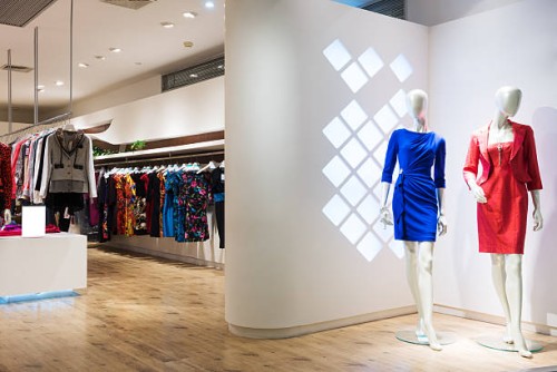 clothes in shop - fashion stock pictures, royalty-free photos & images
